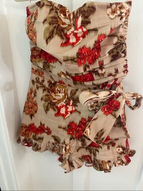 Olivaceous Strapless Floral Tie-Waist Romper in Beige and Orange